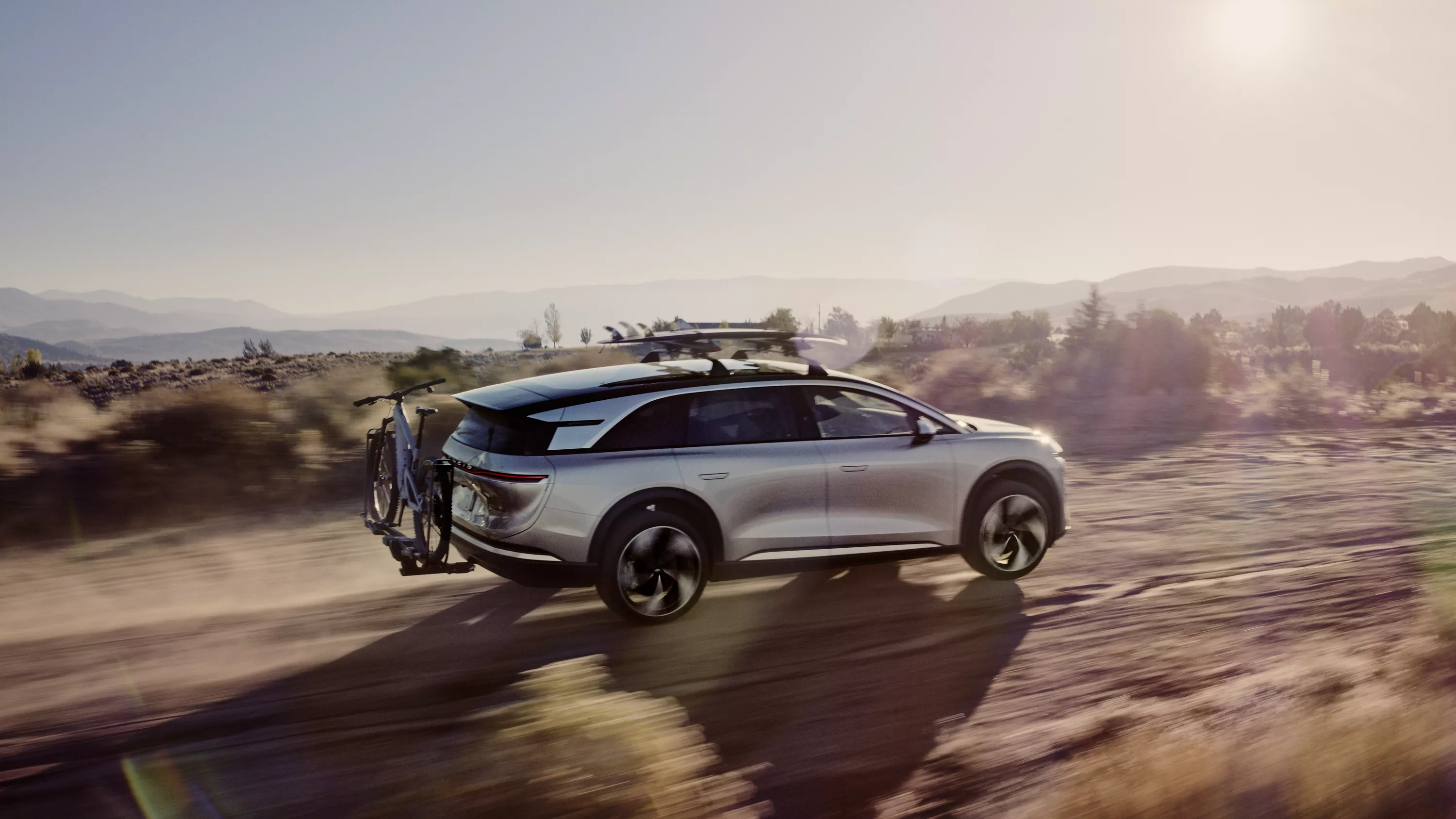 Lucid Gravity driving on dirt road