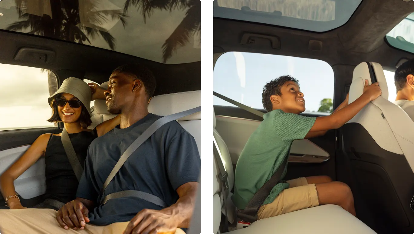 Family enjoying a car ride in Lucid Gravity - adults in front seats with palm trees visible, child in green shirt in back seat looking out window.